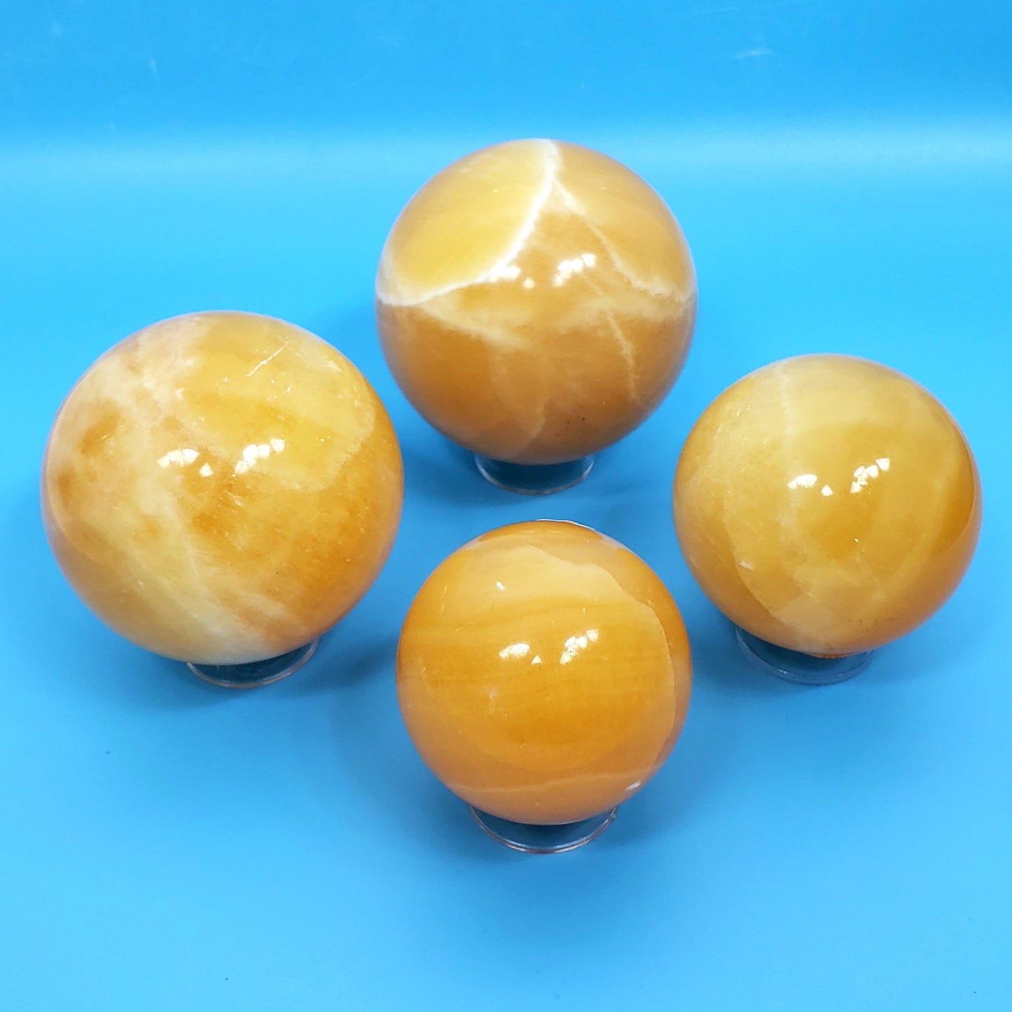 Orange Calcite Spheres – Radiant Bursts of Creative Energy