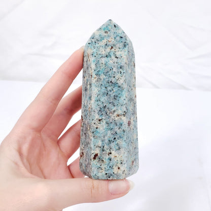 Amazonite Point with Garnet Inclusions