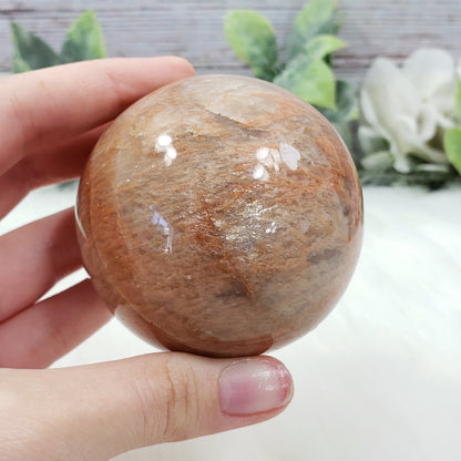 Peach Moonstone 60mm Sphere - Crystal Happenings